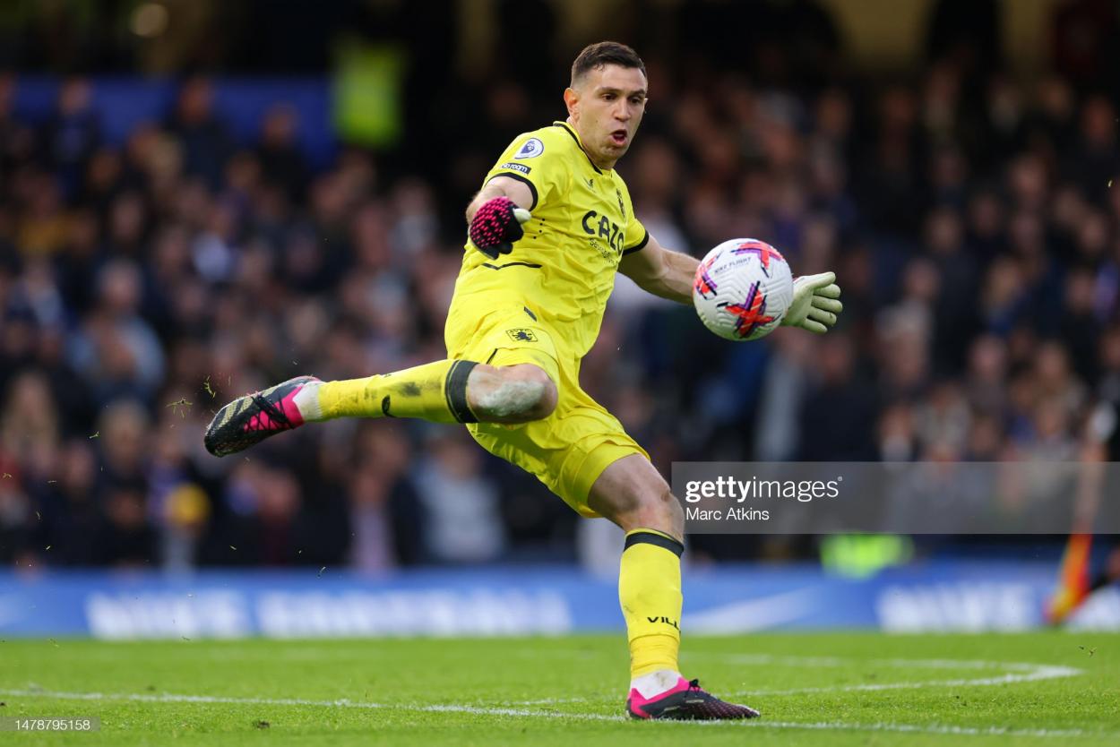 Emiliano Martinez drop-kicks the ball upfield during Aston Villa's encounter with Chelsea, 1st April 2023(Photo by Marc Atkins/Getty Images)
