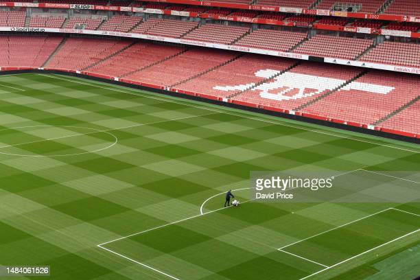 The Arsenal groundsman marks out the pitch before the Premier League match between Arsenal FC and Southampton FC at Emirates Stadium on April 21, 2023 in London, England. (Photo by David Price/Arsenal FC via Getty Images)