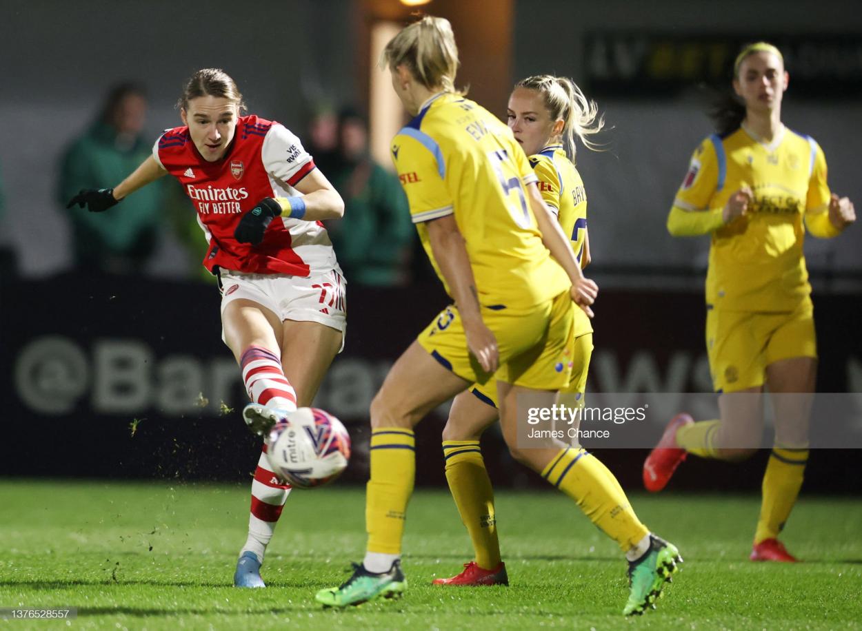  Vivianne Miedema of Arsenal shooting under pressure from Gemma Evans and Faye Bryson during Arsenal Women and Reading Women at Meadow Park. (Photo by James Chance/Getty Images)