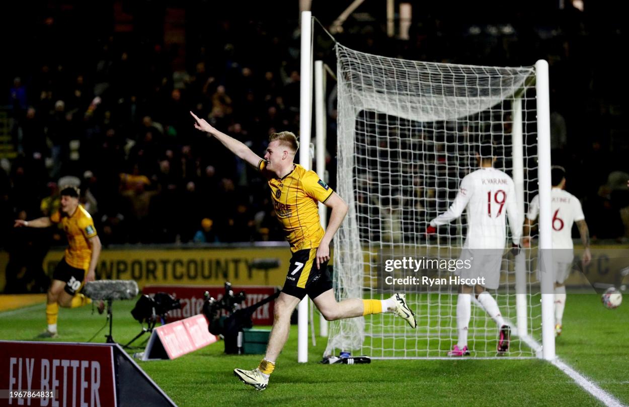 Evans celebrating a historic equaliser. (Photo by Ryan Hiscott via Getty Images)