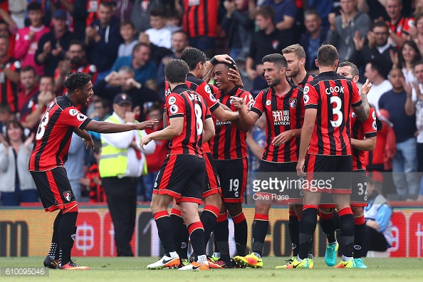 Junior Stanislas celebrates scoring his sides first goal with his team mates. | Photo: Clive Rose/Getty Images