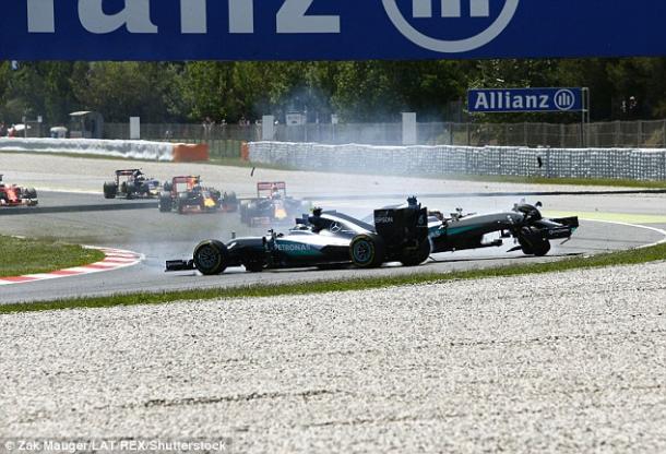 Hamilton and Rosberg spin off (photo: Zak Mauger)