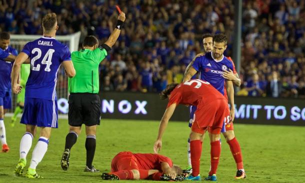 Klavan after Fabregas' red card tackle. (Picture: Liverpool FC via Getty Images)