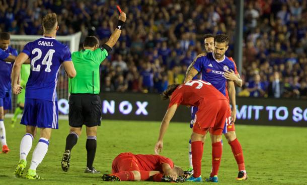 Fabregas saw red for a dangerous late lunge on Klavan. (Picture: Liverpool FC via Getty Images)