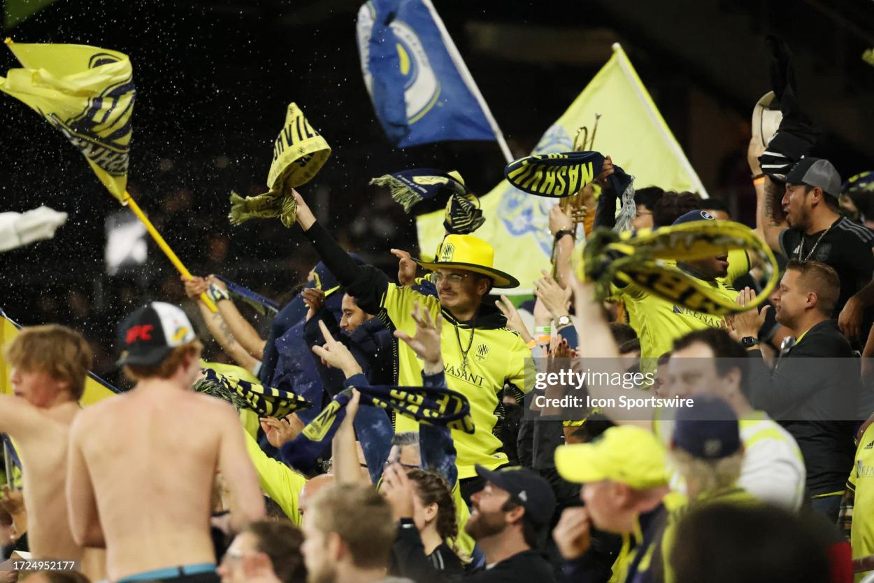 Nashville SC fans celebrate a goal during a match between Nashville SC and New England Revolution, October 14, 2023, at GEODIS Park in Nashville, Tennessee. (Photo by Matthew Maxey/Icon Sportswire via Getty Images)