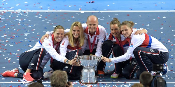 Kvitova and Pliskova along with their Fed Cup team celebrating their latest Fed Cup triumph in November (Photo by Patrick Hertzog / Getty Images)