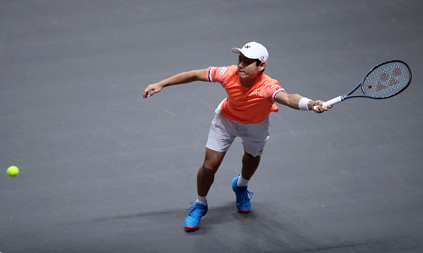 Nishioka with the forehand return Christof Koepsel