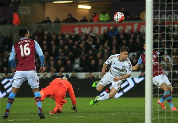 Brad Guzan's error gifted Swansea the win in Garde's final game (photo: getty)