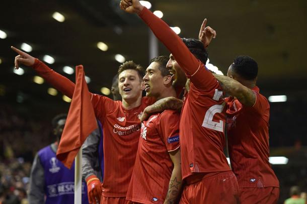 Liverpool players celebrate Firmino's goal to double the lead at Anfield | Photo: Independent