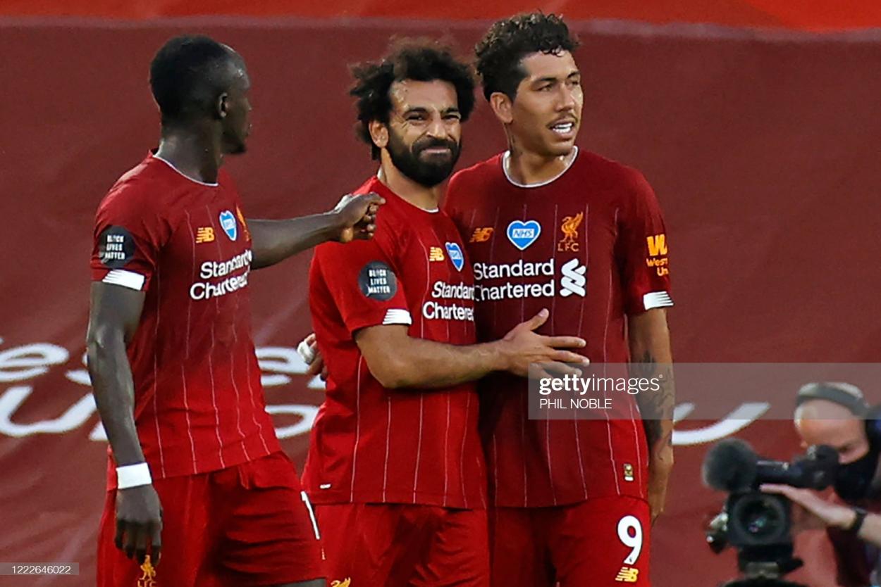 Salah, Mané and Firmino celebrating in 2020