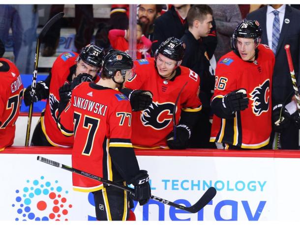 ​ The Calgary Flames celebrate Mark Jankowski's four goal game. (Photo: Al Charest/Postmedia) 