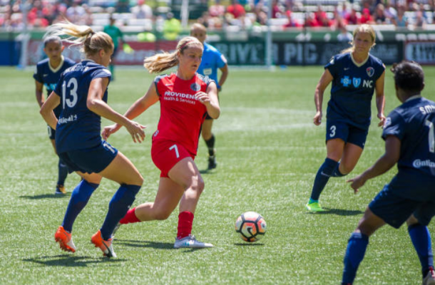 Dahlkemper leads the charge as four Courage players converge on Portland's Lindsey Horan in a 2017 regular season match. | 