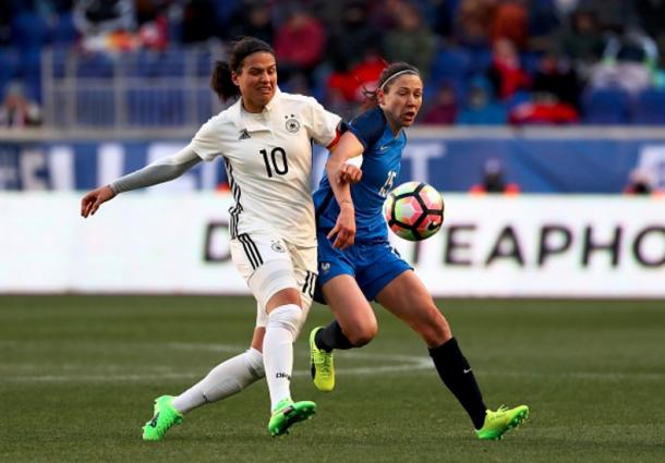 Dzsenifer Marozsan #10 of Germany and Elise Bussaglia #15 of France battling for the ball during the 2017 She Believes Cup. | Photo by Elsa 