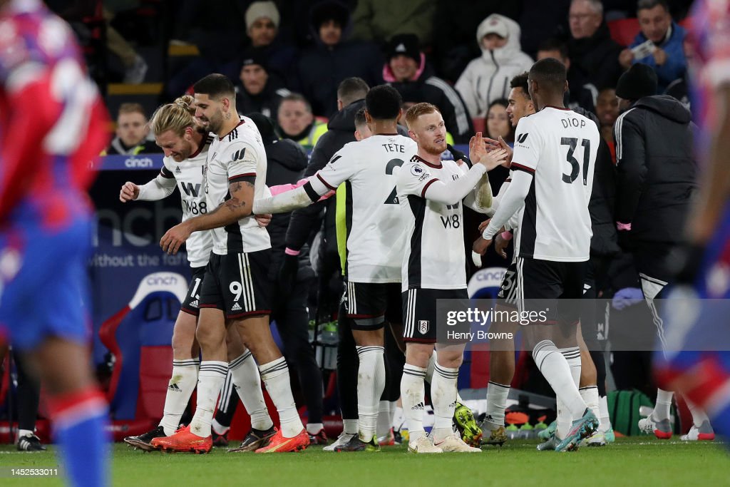 The Fulham players come together after Tim Reams second goal. (Photo by Henry Browne/Getty Images)