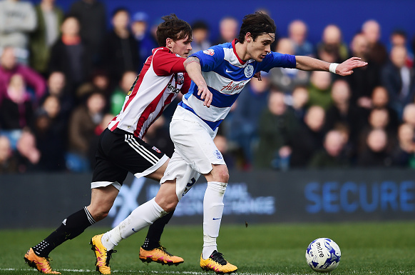 Angella (pictured, right) in action for QPR back in March of this year. | Photo: Getty