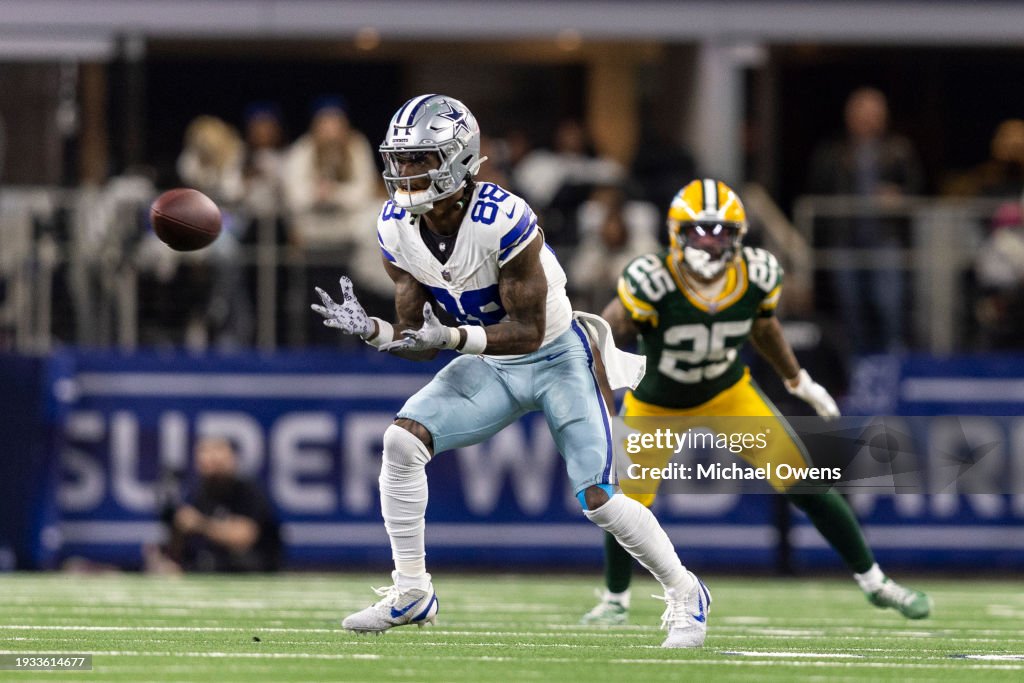 CeeDee Lamb #88 of the Dallas Cowboys completes a pass during an NFL wild-card playoff football game between the Dallas Cowboys and the Green Bay Packers at AT&T Stadium on January 14, 2024 in Arlington, Texas. (Photo by Michael Owens/Getty Images)