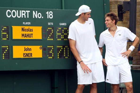 Isner's long five-setters at Wimbledon was likely the cause for change at all the majors. This was his first one, the memorable 70-68 against Mahut in 2010 (Pool/Getty Images)