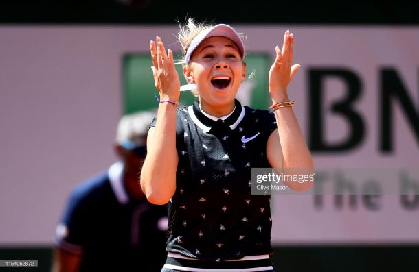 Anismova celebrates after beating Simona Halep in the last eight (Getty Images/Clive Mason)