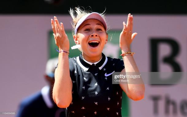 Anisimova celebrates her win over Simona Halep (Getty Images/