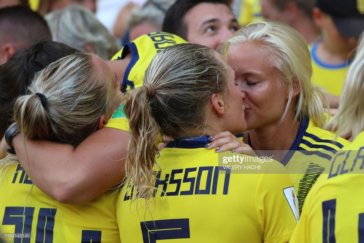 Sweden's defender <strong><a  data-cke-saved-href='https://www.vavel.com/en/football/2023/04/21/womens-football/1144448-chelsea-vs-fc-barcelona-womens-champions-league-preview-semi-final-leg-1-2023.html' href='https://www.vavel.com/en/football/2023/04/21/womens-football/1144448-chelsea-vs-fc-barcelona-womens-champions-league-preview-semi-final-leg-1-2023.html'>Magdalena Eriksson</a></strong> (C) kisses her girlfriend Danish international <strong><a  data-cke-saved-href='https://www.vavel.com/en/football/2023/03/11/womens-football/1140305-chelsea-vs-manchester-united-womens-super-league-preview-gameweek-15-2023.html' href='https://www.vavel.com/en/football/2023/03/11/womens-football/1140305-chelsea-vs-manchester-united-womens-super-league-preview-gameweek-15-2023.html'>Pernille Harder</a></strong> (R) as she celebrates her team's victory at the end of the France 2019 Women's World Cup third place final football match between England and Sweden, on July 6, 2019, at Nice stadium in Nice south-eastern France. (Photo by Valery HACHE / AFP) (Photo credit should read VALERY HACHE/AFP via Getty Images)
