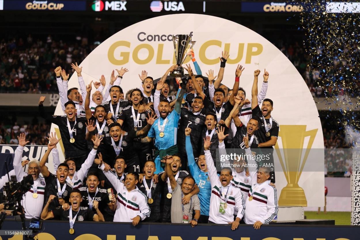 Mexico players celebrate with the CONCACAF <strong><a  data-cke-saved-href='https://www.vavel.com/en/international-football/2014/05/28/354621.html' href='https://www.vavel.com/en/international-football/2014/05/28/354621.html'>Gold Cup</a></strong> trophy after their 1-0 victory over USA in the 2019 CONCACAF <strong><a  data-cke-saved-href='https://www.vavel.com/en/international-football/2014/05/28/354621.html' href='https://www.vavel.com/en/international-football/2014/05/28/354621.html'>Gold Cup</a></strong> Final (Photo by Matthew Ashton - AMA/Getty Images)