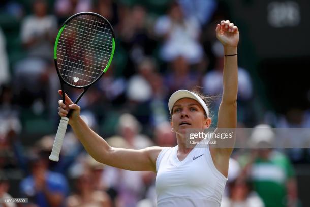 Simona Halep celebrates her first round victory over Aliaksandra Sasnovich (Getty Images/Clive Brunskill)