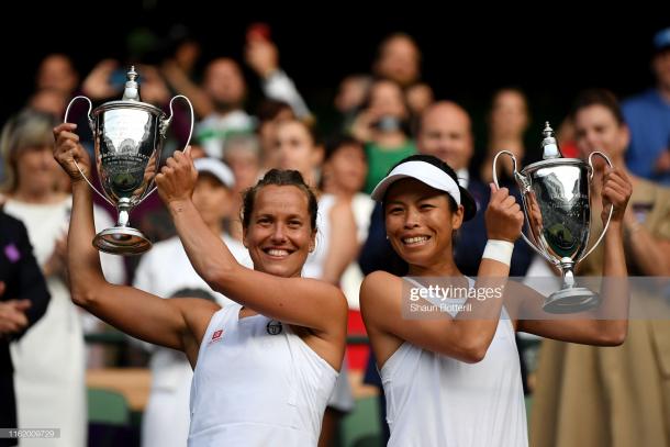 Hsieh and Strycova proudly lift their trophies | Photo: Shaun Botterill/Getty Images