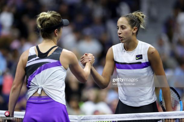 Elina Svitolina and Madison Keys meet at the net | Photo: Matthew Stockman/Getty Images