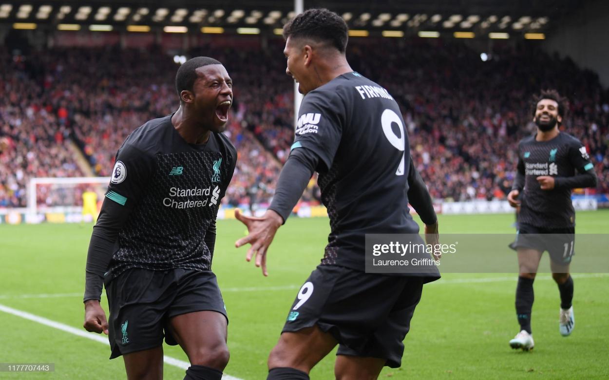 Wijnaldum celebrates with Roberto Firmino after scoring against Sheffield United (Photo: Laurence Griffiths/GETTY Images)
