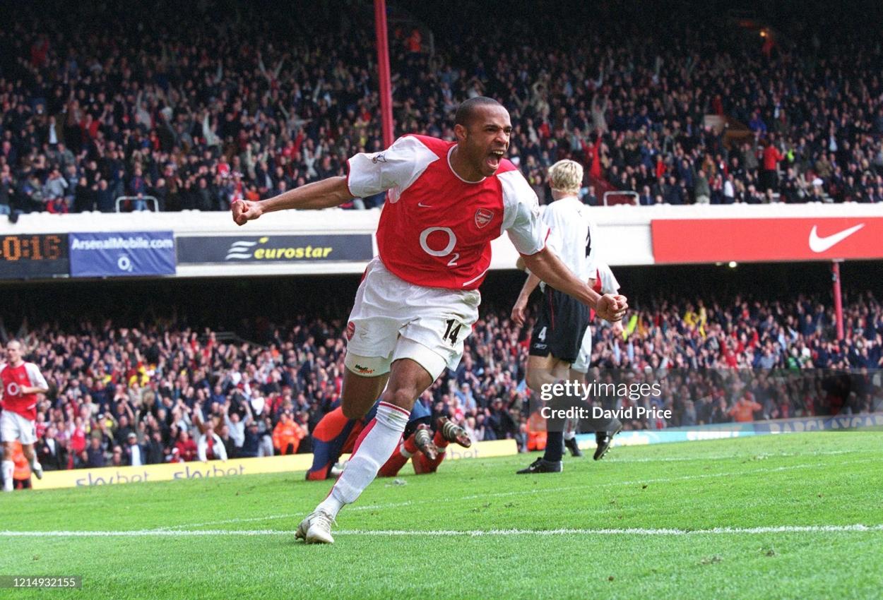 LONDON, ENGLAND - APRIL 9: Thierry Henry celebrates scoring arsenal's 3rd goal, his 2nd, during the Premier League match between Arsenal and Liverpool on April 9, 2004 in London, England. (Photo by David Price/Arsenal FC via Getty Images)