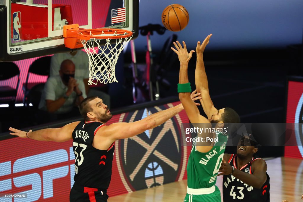 LAKE BUENA VISTA, FLORIDA - SEPTEMBER 09: Jayson Tatum #0 of the Boston Celtics shoots against Marc Gasol #33 of the Toronto Raptors and Pascal Siakam #43 of the Toronto Raptors in the first half during Game Six of the second round of the 2020 NBA Playoffs at ESPN Wide World of Sports Complex on September 9, 2020 in Lake Buena Vista, Florida. NOTE TO USER: User expressly acknowledges and agrees that, by downloading and or using this photograph, User is consenting to the terms and conditions of the Getty Images License Agreement. (Photo by Kim Klement-Pool/Getty Images)