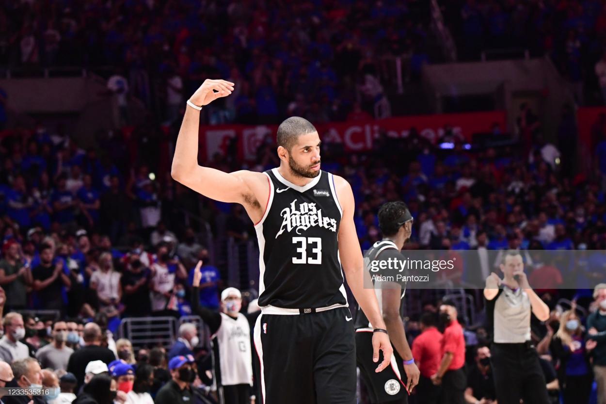 LOS ANGELES, CA - JUNE 18: Nicolas Batum #33 of the LA Clippers pumps up the crowd during the game against the Utah Jazz during Round 2, Game 6 of the 2021 NBA Playoffs on June 18, 2021 at STAPLES Center in Los Angeles, California. NOTE TO USER: User expressly acknowledges and agrees that, by downloading and/or using this Photograph, user is consenting to the terms and conditions of the Getty Images License Agreement. Mandatory Copyright Notice: Copyright 2021 NBAE (Photo by Adam Pantozzi/NBAE via Getty Images)