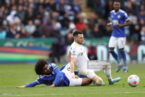 LEICESTER, ENGLAND - MARCH 05: Hamza Choudhury of <strong><a href='https://www.vavel.com/en/football/2021/11/19/leicester-city/1093276-leicester-city-vs-chelsea-predicted-line-ups.html'>Leicester City</a></strong> and Jack Harrison of Leeds United during the Premier League match between <strong><a href='https://www.vavel.com/en/football/2021/11/19/leicester-city/1093276-leicester-city-vs-chelsea-predicted-line-ups.html'>Leicester City</a></strong> and Leeds United at The King Power Stadium on March 5, 2022 in Leicester, United Kingdom. (Photo by James Williamson - AMA/Getty Images)