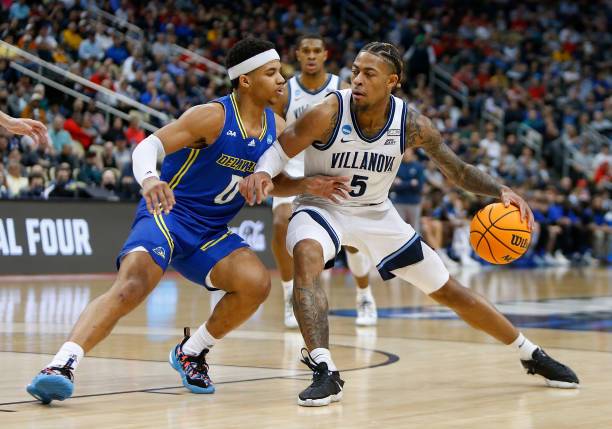 Justin Moore of Villanova is guarded by Delaware's Jameer Nelson Jr. during the teams' first-round game in the NCAA Tournament/Photo: Justin K. Aller/NCAA Photos via Getty Images