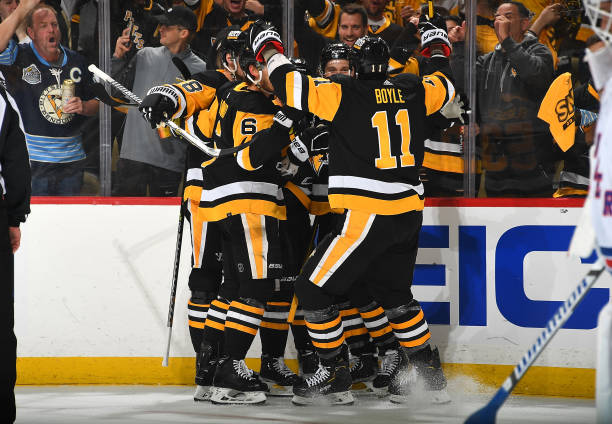 Jeff Carter celebrates with teammates after scoring in the first period of Game 3/Photo: Joe Sargent/NHLI via Getty Images