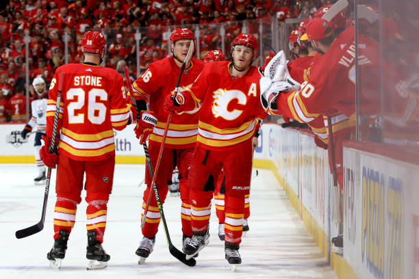 Matthew Tkachuk is congratulated after scoring one of his three goals in Game 1/Photo: Gerry Thomas/NHLI via Getty Images