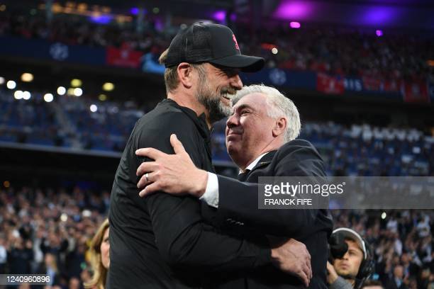 Jurgen Klopp and Carlo Ancelotti embrace during the Champions League final (Photo:Franck Fife/UEFA via GETTY Images)