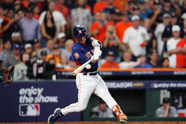 Alex Bregman singles in a run for the Astros late in Game 2/Photo: Daniel Shirey/Getty Images