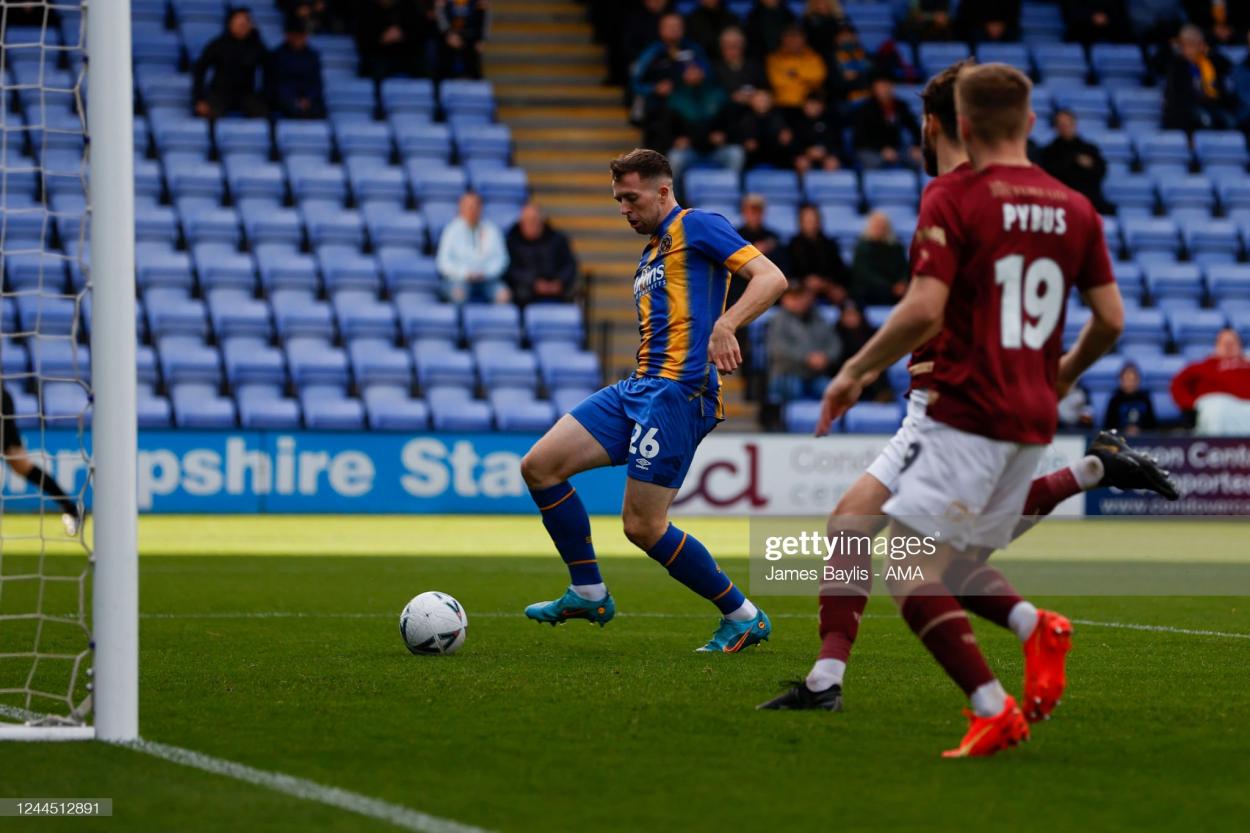SHREWSBURY, ENGLAND - NOVEMBER 05: Jordan Shipley of Shrewsbury Town scores a goal to make it 1-0 during the Emirates FA Cup First Round match between Shrewsbury Town and York City at Montgomery Waters Meadow on November 5, 2022 in Shrewsbury, England. (Photo by James Baylis - AMA/Getty Images)
