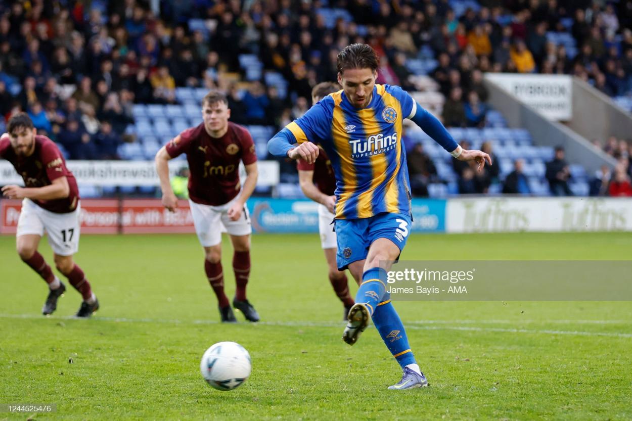 SHREWSBURY, ENGLAND - NOVEMBER 05: Luke Leahy of Shrewsbury Town scores a goal to make it 2-0 from the penalty spot during the Emirates FA Cup First Round match between Shrewsbury Town and York City at Montgomery Waters Meadow on November 5, 2022 in Shrewsbury, England. (Photo by James Baylis - AMA/Getty Images)