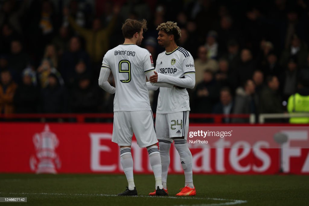Patrick Bamford of <strong><a  data-cke-saved-href='https://www.vavel.com/en/football/2023/04/17/premier-league/1144101-leeds-united-1-6-liverpool-post-match-player-ratings.html' href='https://www.vavel.com/en/football/2023/04/17/premier-league/1144101-leeds-united-1-6-liverpool-post-match-player-ratings.html'>Leeds United</a></strong> talks to <strong><a  data-cke-saved-href='https://www.vavel.com/en/football/2023/02/05/premier-league/1136851-nottingham-forest-vs-leeds-post-match-player-ratings.html' href='https://www.vavel.com/en/football/2023/02/05/premier-league/1136851-nottingham-forest-vs-leeds-post-match-player-ratings.html'>Georginio Rutter</a></strong> of <strong><a  data-cke-saved-href='https://www.vavel.com/en/football/2023/04/17/premier-league/1144101-leeds-united-1-6-liverpool-post-match-player-ratings.html' href='https://www.vavel.com/en/football/2023/04/17/premier-league/1144101-leeds-united-1-6-liverpool-post-match-player-ratings.html'>Leeds United</a></strong> during the FA Cup 4th Round match between Accrington Stanley and Leeds United at the Wham Stadium, Accrington on Saturday 28th January 2023. (Photo by Pat Scaasi/MI News/NurPhoto via Getty Images)