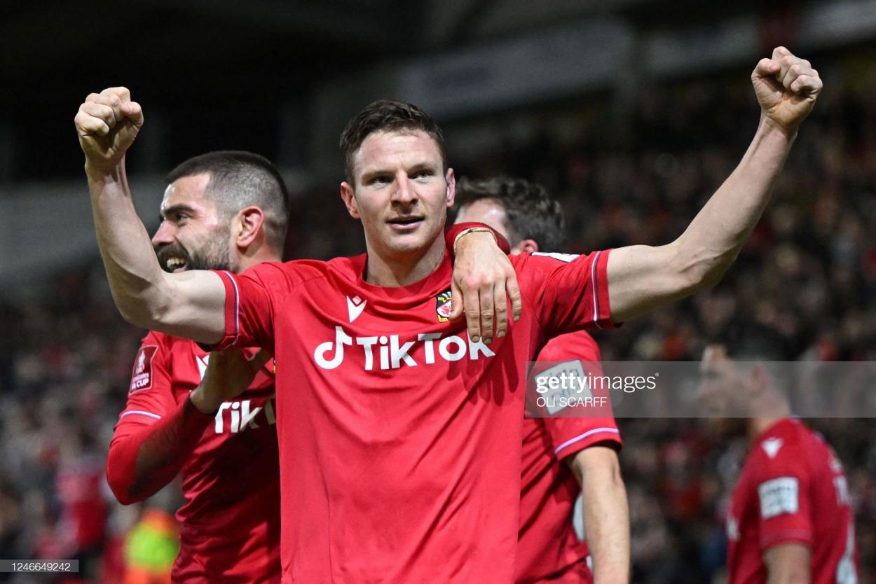 Paul Mullin netted Wrexham's second from the spot (Photo by OLI SCARFF/AFP via Getty Images)