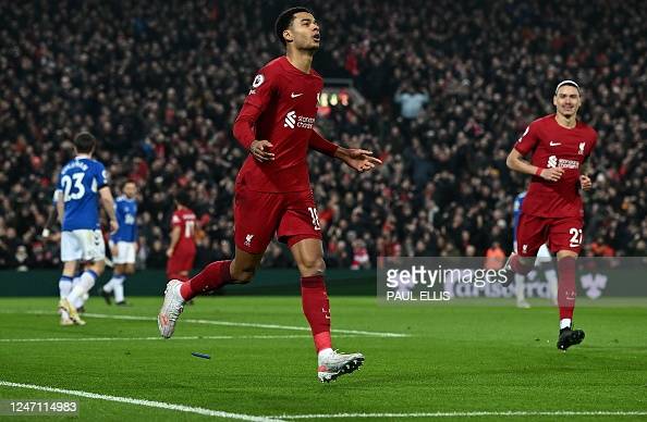 Cody Gakpo and Darwin Núñez celebrate after the former scored Liverpool's second goal in the 2-0 win over Everton (Photo by Paul Ellis/AFP via Getty Images)