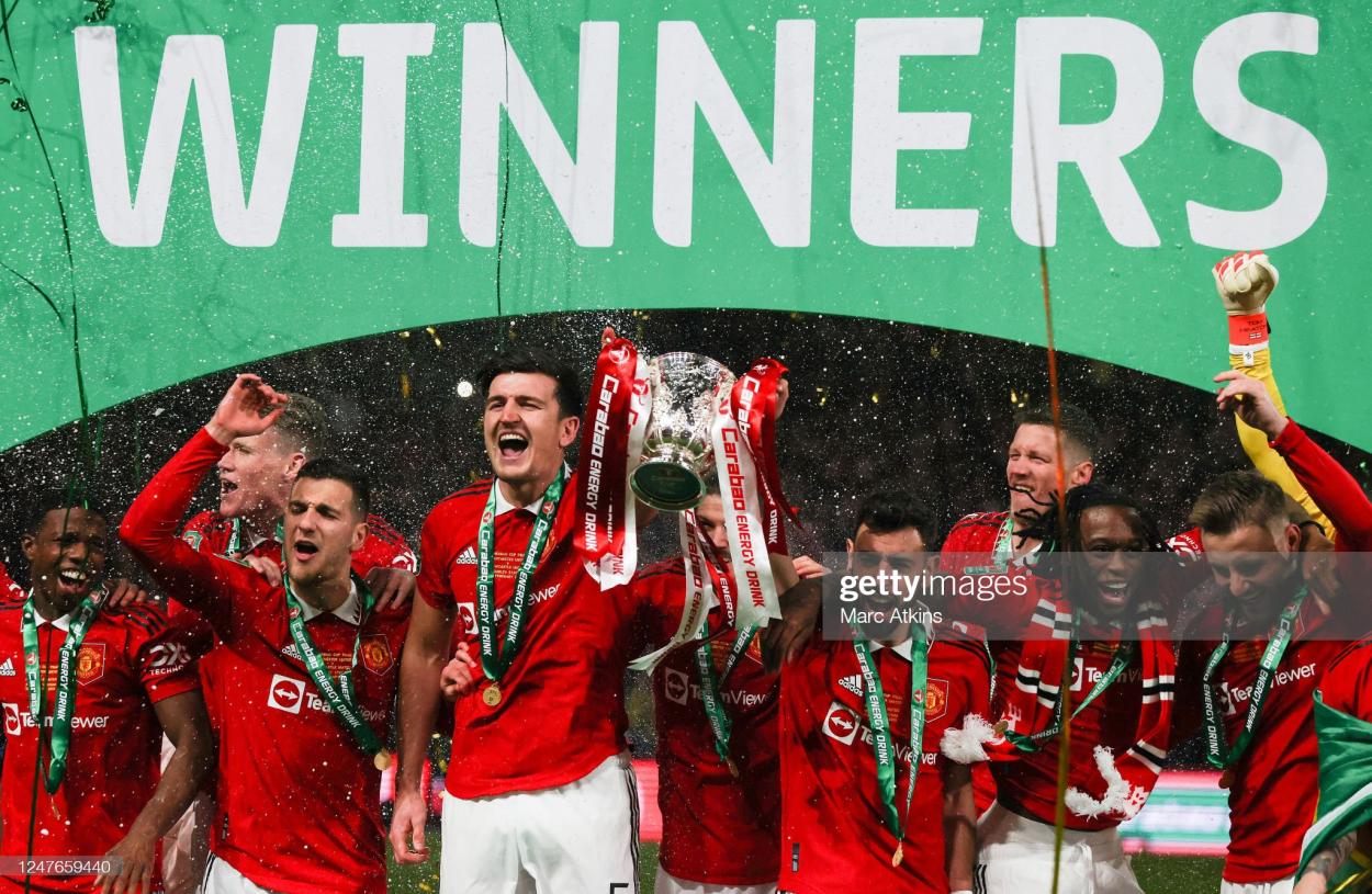 Harry Maguire lifts the League Cup in February. (Photo by Marc Atkins/Getty Images)