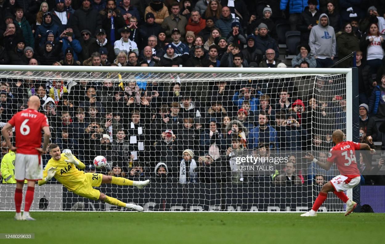 Andre Ayew misses the penalty. (Photo by JUSTIN TALLIS/AFP via Getty Images)