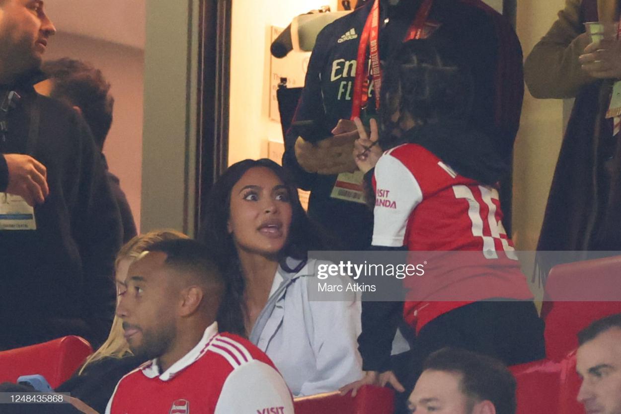 Kim Kardashian watches from the stands with her son Saint West during the UEFA Europa League round of 16 leg two match between Arsenal FC and Sporting CP at Emirates Stadium on March 16, 2023 in London, United Kingdom. (Photo by Marc Atkins/Getty Images)