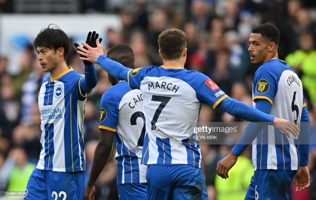 <strong><a  data-cke-saved-href='https://www.vavel.com/en/football/2023/03/12/premier-league/1140444-leeds-united-2-2-brighton-player-ratings.html' href='https://www.vavel.com/en/football/2023/03/12/premier-league/1140444-leeds-united-2-2-brighton-player-ratings.html'>Solly March</a></strong> congratulates <strong><a  data-cke-saved-href='https://www.vavel.com/en/football/2023/03/05/premier-league/1139654-brighton-and-hove-albion-4-0-west-ham-united-a-hammering-in-the-south-coast.html' href='https://www.vavel.com/en/football/2023/03/05/premier-league/1139654-brighton-and-hove-albion-4-0-west-ham-united-a-hammering-in-the-south-coast.html'>Kauro Mitoma</a></strong> on his goal in the FA Cup against Grimsby - 