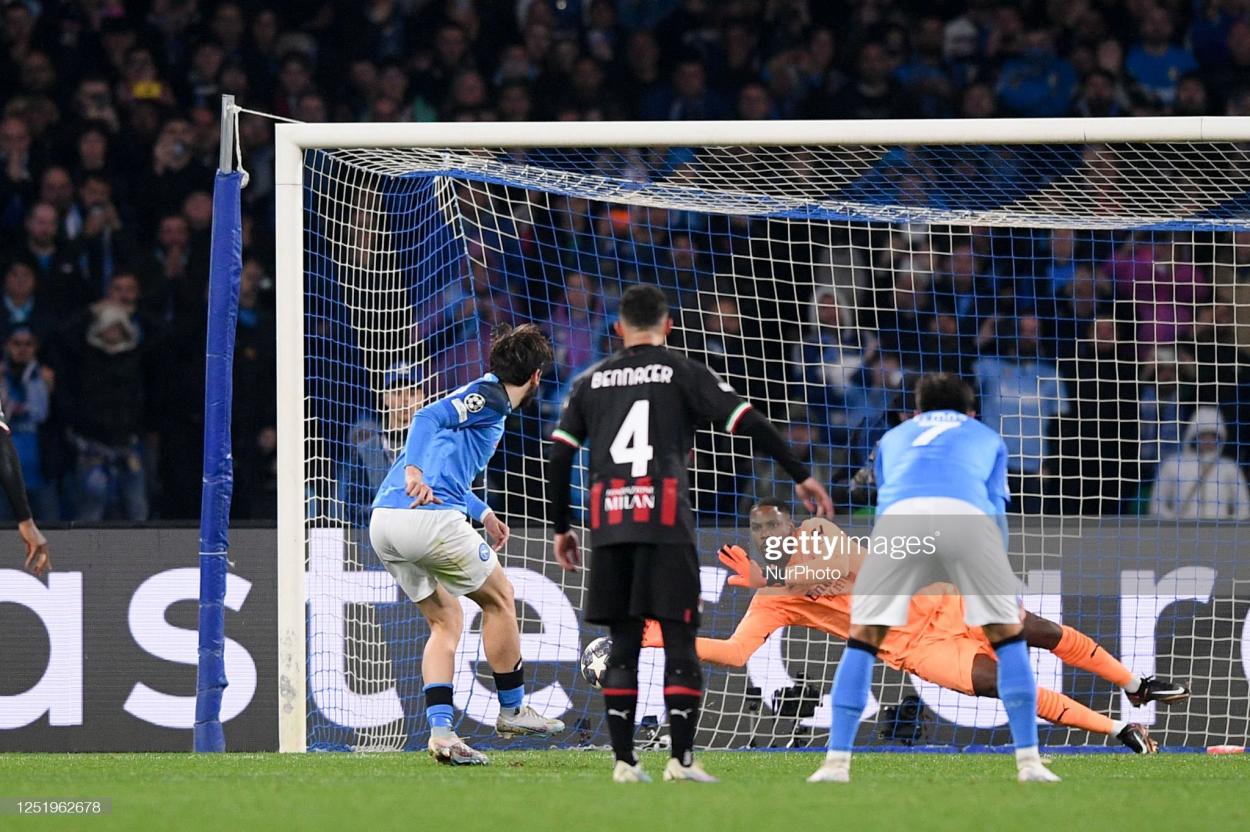 Khvicha Kvaratskhelia of Napoli has his penalty saved by Mike Maignon of AC Milan during the clubs' <strong><a  data-cke-saved-href='https://www.vavel.com/en/international-football/2023/04/18/champions-league/1144227-chelsea-0-2-real-madrid-clinical-los-blancos-cruise-through-to-semi-finals.html' href='https://www.vavel.com/en/international-football/2023/04/18/champions-league/1144227-chelsea-0-2-real-madrid-clinical-los-blancos-cruise-through-to-semi-finals.html'>Champions League</a></strong> quarter-final second-leg at Stadio Diego Armando Maradona (Photo by Giuseppe Maffia/NurPhoto via Getty Images)