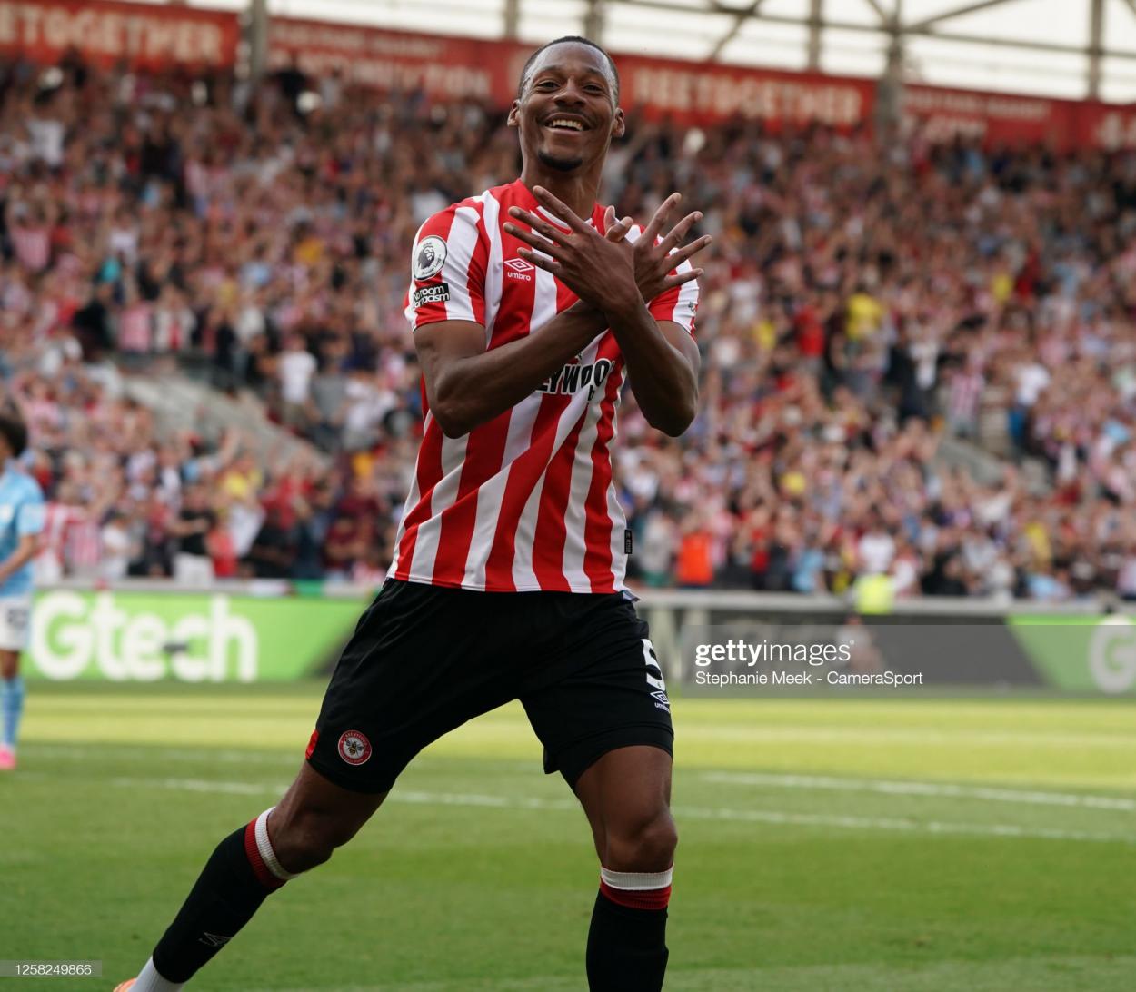 Ethan Pinnock celebrates his goal to give Brentford all three points against Man City on the final day of the season(Photo by Stephanie Meek - CameraSport via Getty Images)