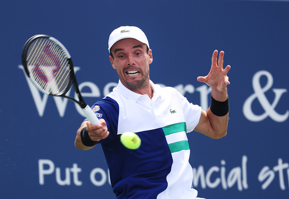 Several of our writers are picking Bautista Agut to struggle (Image: Al Bello)